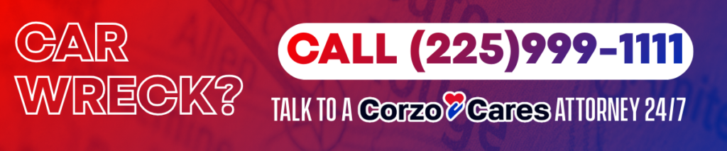 Promotional banner with red and purple gradient background that reads “Car Wreck? Call (225) 999-1111.” Smaller text says “Talk to a Corzo Cares Attorney 24/7,” encouraging immediate legal help after a crash.